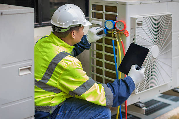Professional Ac Installation technician working in Marion, KS